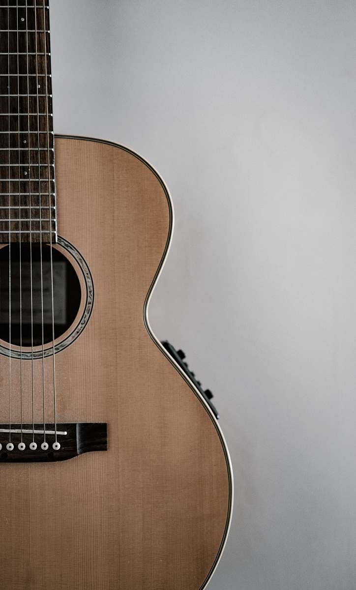 leisure activities brown guitar musical instrument